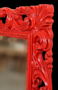 Red framed Venetian mirror