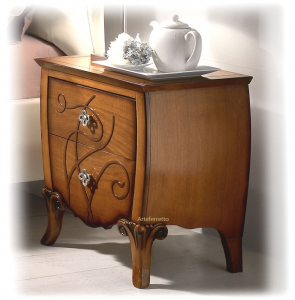 Decorated bedside table in wood