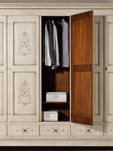 Decorated wardrobe in solid wood