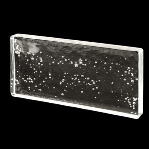 Blocco tavella mattone in vetro di Murano trasparente con effetto bolle interne.