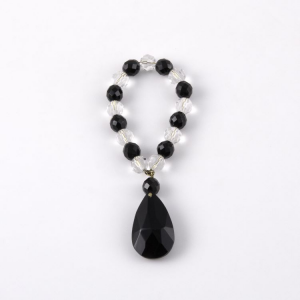 Anello portatovagliolo con perle in cristallo nero Ø10 mm con ciondolo nero.