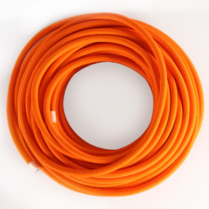 Round electric cable insulated in PVC covered with orange fabric. Section 3x0,75