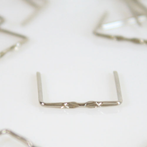 Clip 14 mm nickel finish star design for chandelier crystal hooks.