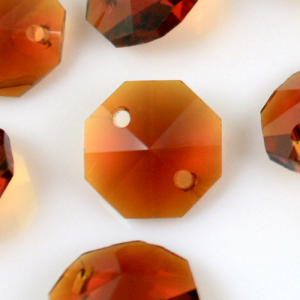 Octagon 14mm amber warm crystal glass beveled 16 faces 2 holes.