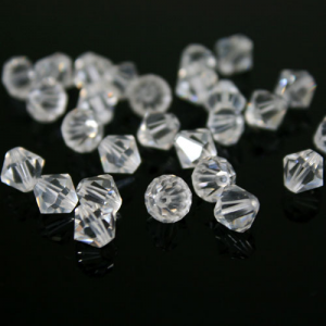 Perla bicono 7 mm cristallo trasparente 8505 Swarovski bead