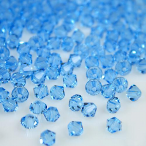 Perla bicono Aquamarine 4 mm cristallo Swarovski 5328 bead