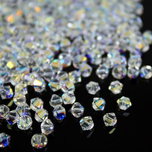 Perla bicono Aurora Boreale 4 mm cristallo Swarovski 5328 bead