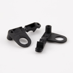 Cable clamp with hole for 10 mm barrel and screw cable closure, black color.