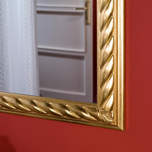 Espejo rectangular con marco trenzado en pan de oro