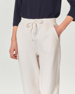 Pantaloni avorio in jersey di misto cotone con elastico e coulisse inseriti in vita