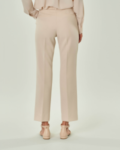 Pantaloni bootcut color gesso in tessuto stretch con chiusura laterale