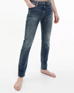 Jeans blu scuro slim fit in cotone stretch lavaggio stone washed con baffature e sabbiature