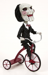 *PREORDER* Saw Head Knocker Bobble-Head: PUPPET ON TRICYCLE by Neca