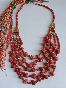 Red multi strand necklace