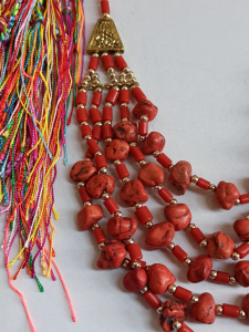 Red multi strand necklace