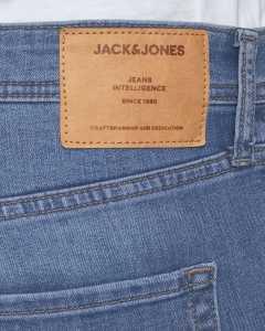 Jeans Glenn slim fit in cotone stretch lavaggio chiaro stone washed con baffature