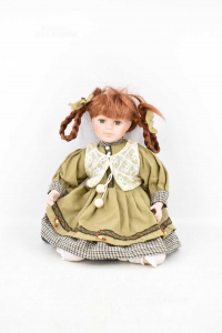 Doll Ceramic With Hair Red And Dress Green,sitting