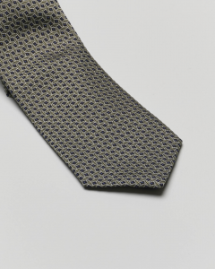 Cravatta verde militare in fantasia geometrica di misto seta e cotone