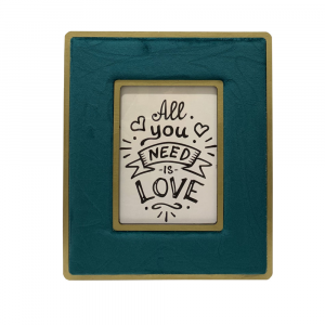 Single wooden photo frame covered in petroleum colored velvet with gilded details made in Italy