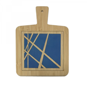 Hand-decorated bamboo cutting board with geometric lines pattern on a blue background, made in Italy