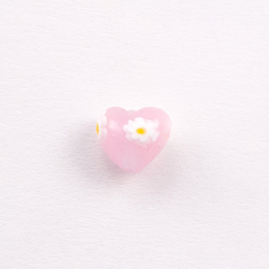 Perla cuore in vetro di Murano con Murrine bianche, colore rosa trasparente Ø12 mm. Con foro passante.