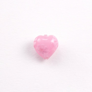 Perla cuore in vetro di Murano con Murrine in tono, colore rosa trasparente Ø12 mm. Con foro passante.