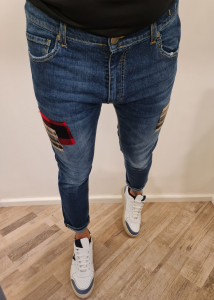 Jeans v2 con toppe laterali